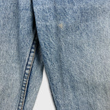Vintage Levi’s Jeans Womens 26x30 Blue Slim Taper Light Wash Fray Distress 90s Pants