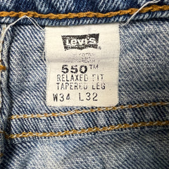 Vintage 90s Levi's 550 Jeans Mens 34x29 Blue Relaxed Fit Tapered Leg Frayed Denim
